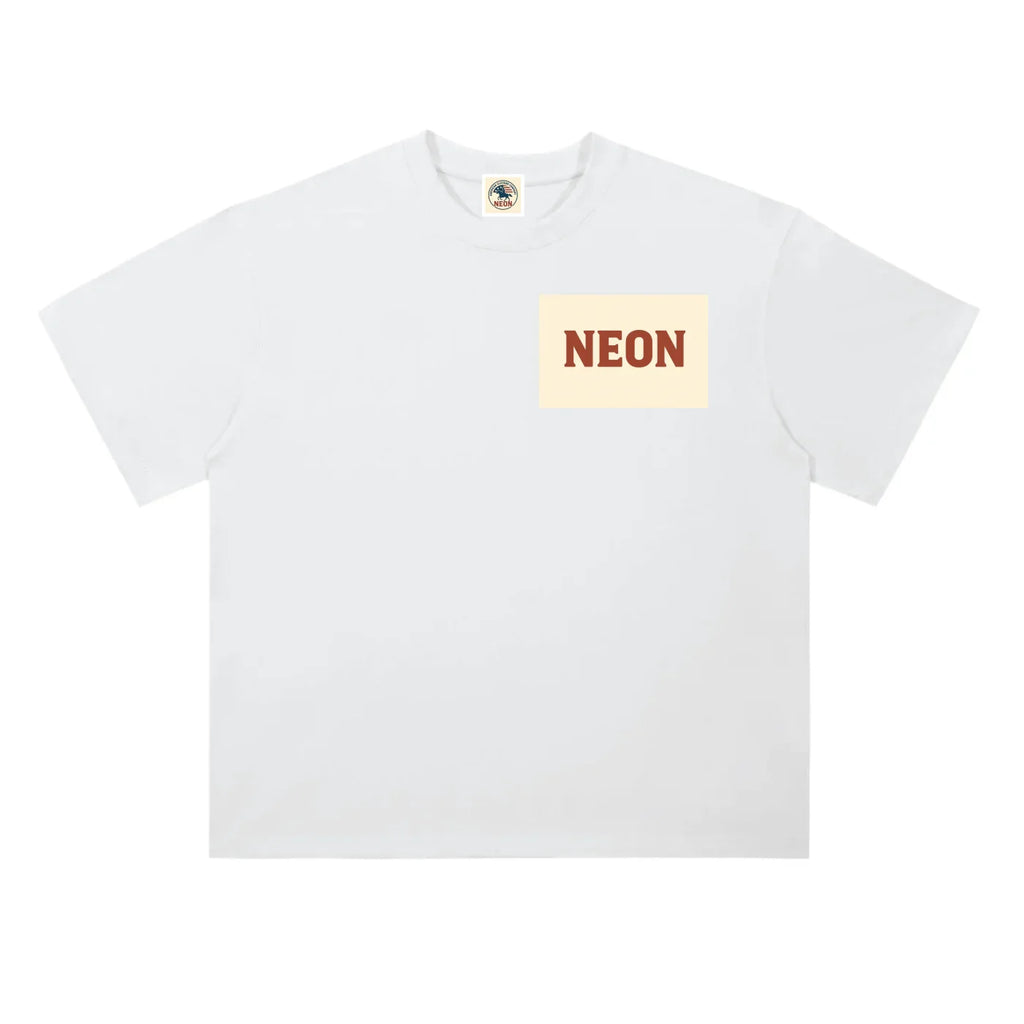 White short sleeve t-shirt with NEON text in bold red on cream chest patch