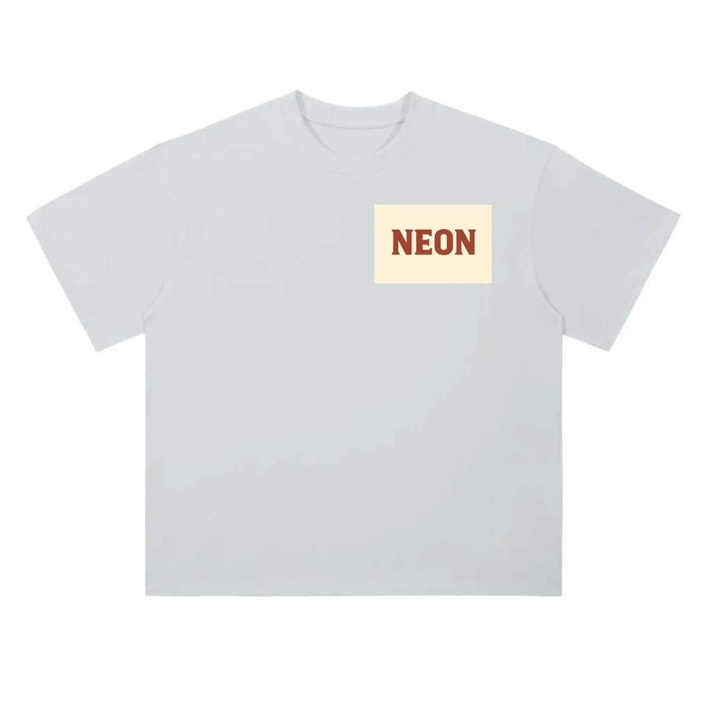 White t-shirt with NEON logo in bold red letters on chest, modern American style.