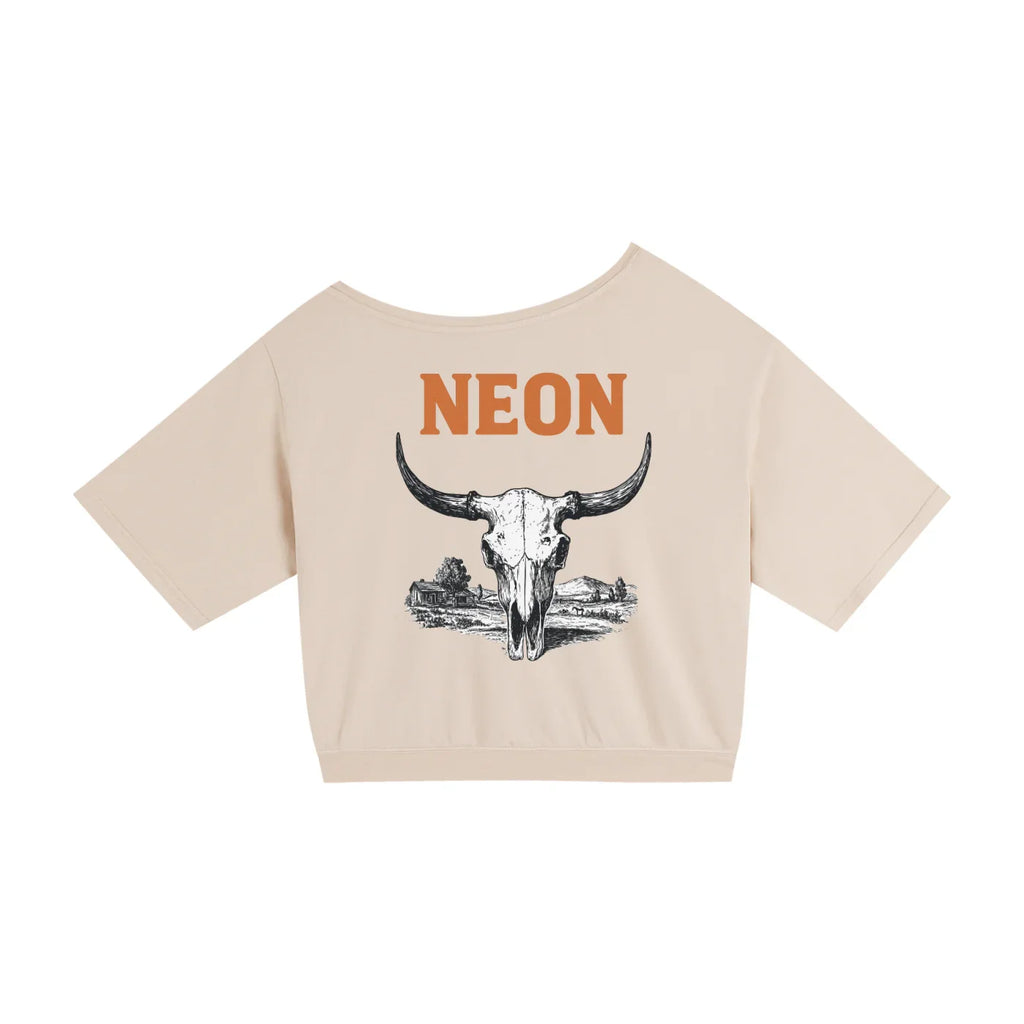 Beige cropped t-shirt with NEON text and bull skull graphic, western style design